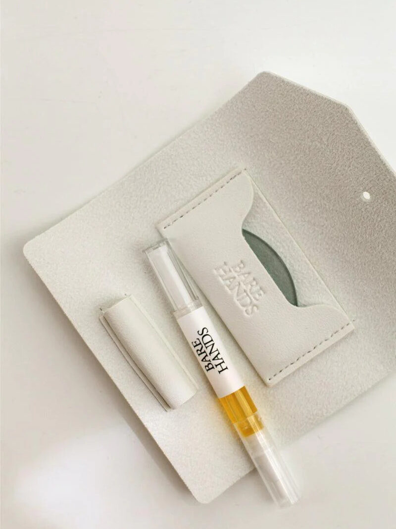 The Bare Hands Dry Gloss Manicue Kit.