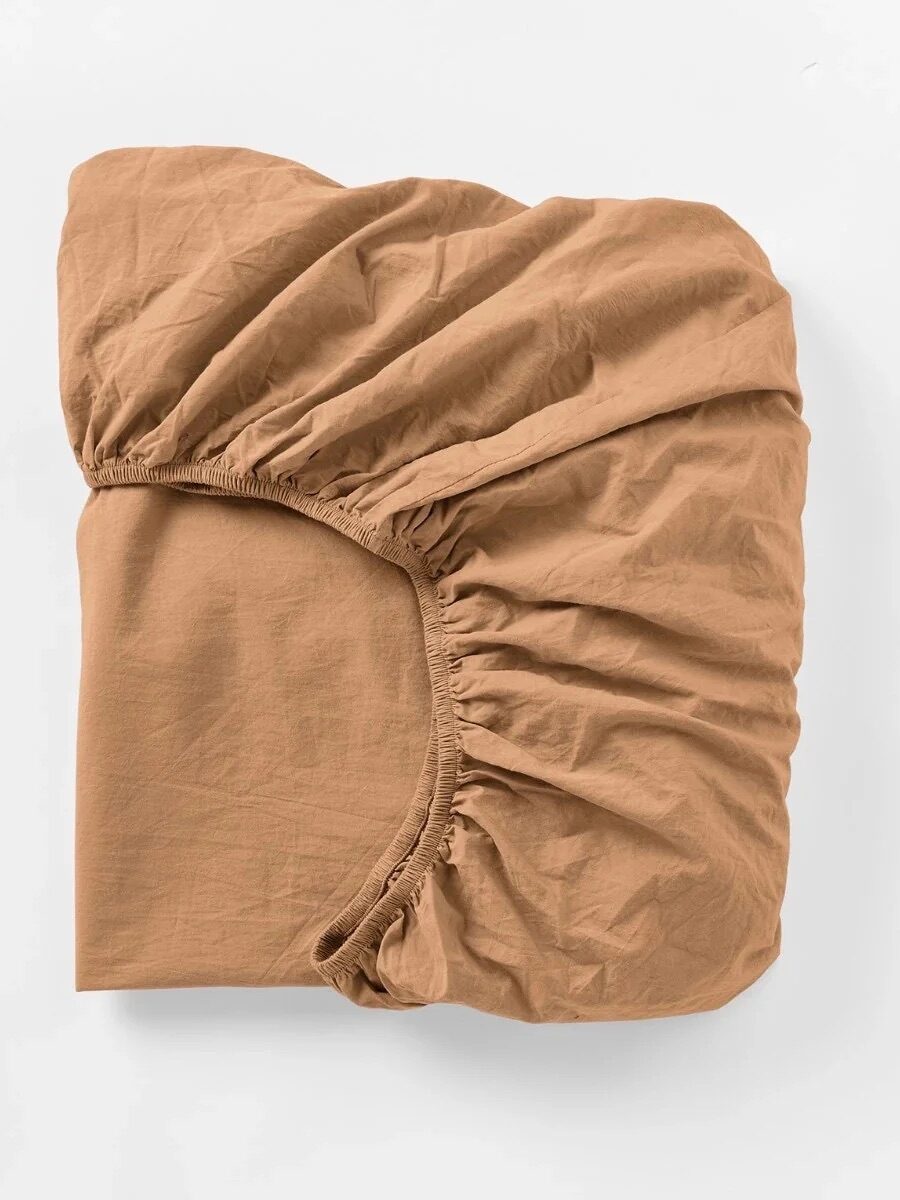 Coyuchi crib sheets in khaki brown.